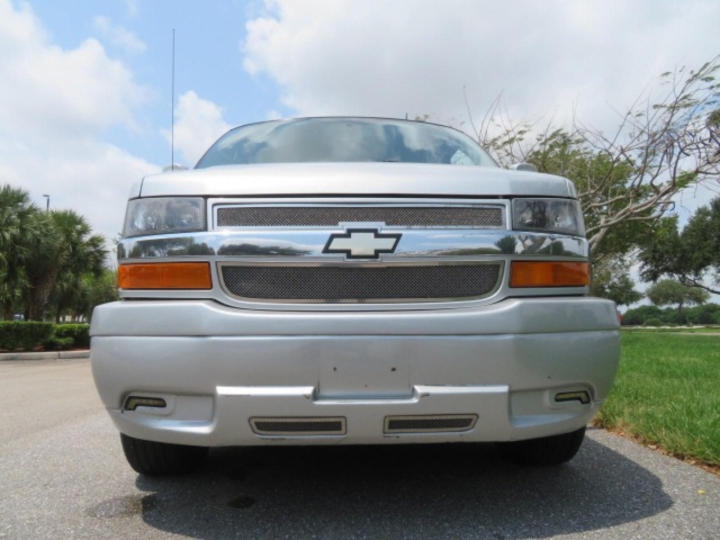 2014 Chevrolet Express (1GBWGLCG3E1) , located at 4301 Oak Circle #19, Boca Raton, FL, 33431, (954) 561-2499, 26.388861, -80.084038 - You are looking at a Rare 2014 Chevy Express 2500 Quigley 4x4 Four Wheel Drive Explorer Limited SE 9 Passenger Conversion Van with: 107K Original Miles, 6 Captain Chairs, Rear Power Folding Bench Seat Bed, Center Consoler Cooler, Front PPF (Paint Protection Film) Explorer Limited Conversion Througho - Photo#21